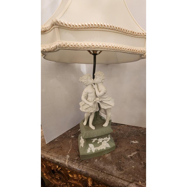 This listing features a pair of porcelain Rococo Revival cameo jasperware style. Jasperware is a type of pottery first...