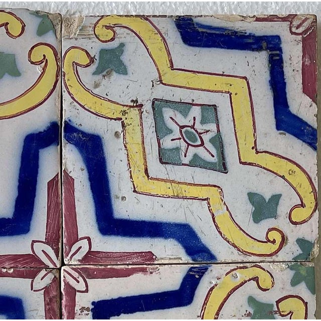Earthenware - Set of 34 tiles - 19th century. Portuguese, 19th century; polychrome decoration. Dimensions: 14x14 cm