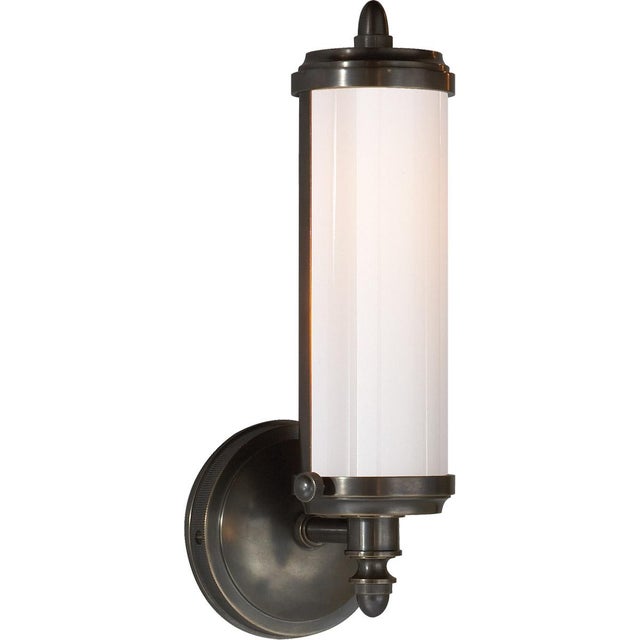 Merchant Single Bath Light in Bronze with White Glass Designer: Thomas O'Brien Height: 12.25" Extension: 5.75" Backplate:...