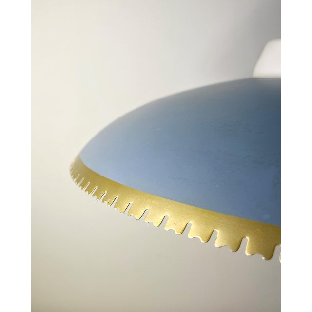 Designed by Danish lighting designer Bent Karlby and produced in Denmark by Fog & Mørup during the 1960s. The lamp...