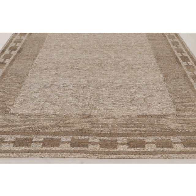Handwoven in an innovative, eco-conscious blend of natural aloe, hemp, and linen, this oversized 9x13 flatweave rug is a...