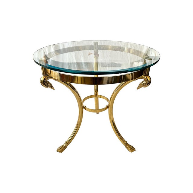 This pair of tables has a unique swan motif on the base. The base is brass, and the top is removable glass. They could...