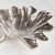 A traditional method of sand casting by hand is what creates the natural leaf details. Made of aluminum, this substantial...