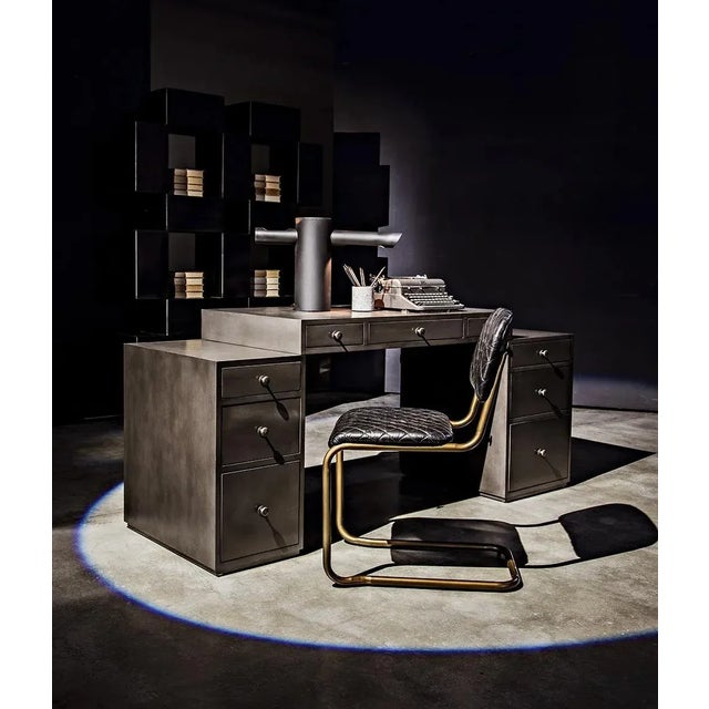 Add a strong sculptural element to any contemporary decor with this striking light from Noir. Each is handcrafted of metal...