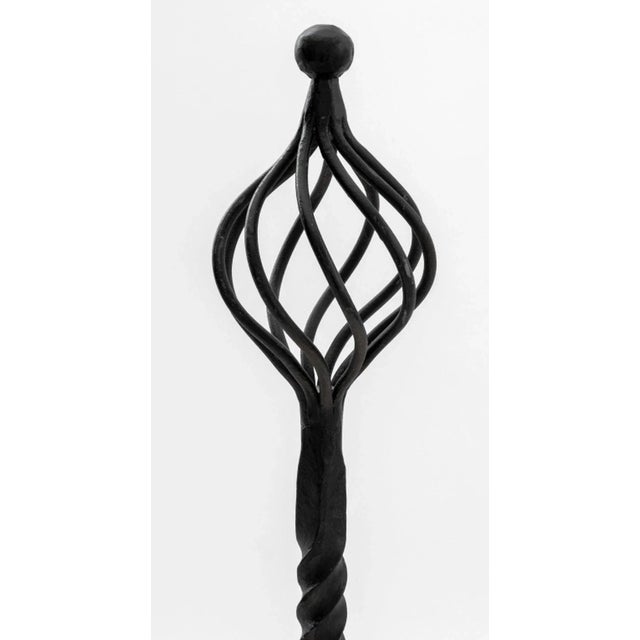 Pair of Gothic Revival Wrought Iron Andirons, with openwork twist finial and twist support on scroll form base. 24.25" H x...