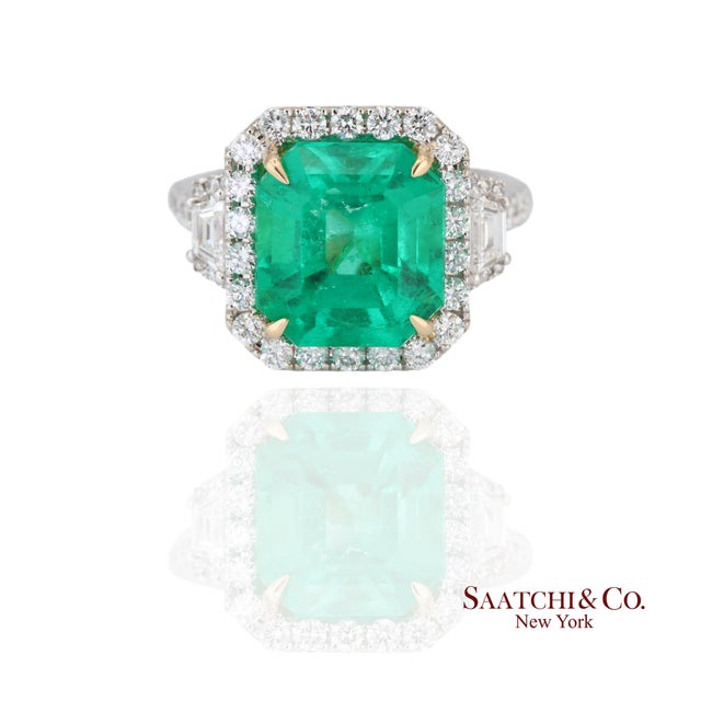 Emerald and Diamond Ring Metal Type: 18k Gold, White Gold Total Item Weight: 8.9 Grams Ring Size: 6 (Resizable)...