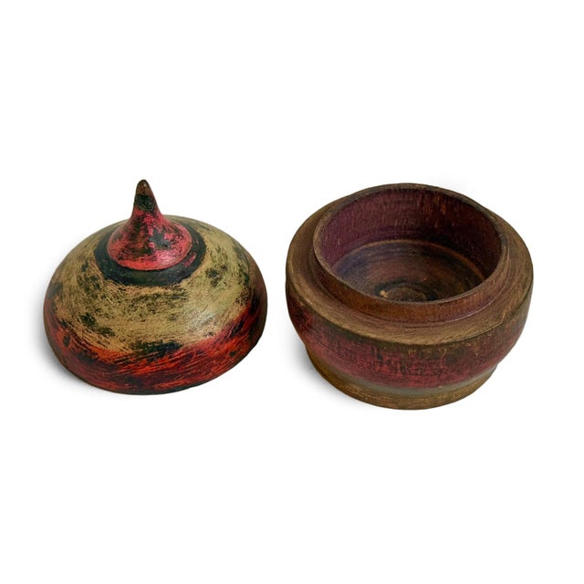 Authentic vintage wood tikka box from India painted with traditional ring designs. Beautiful worn patina. These beautiful...