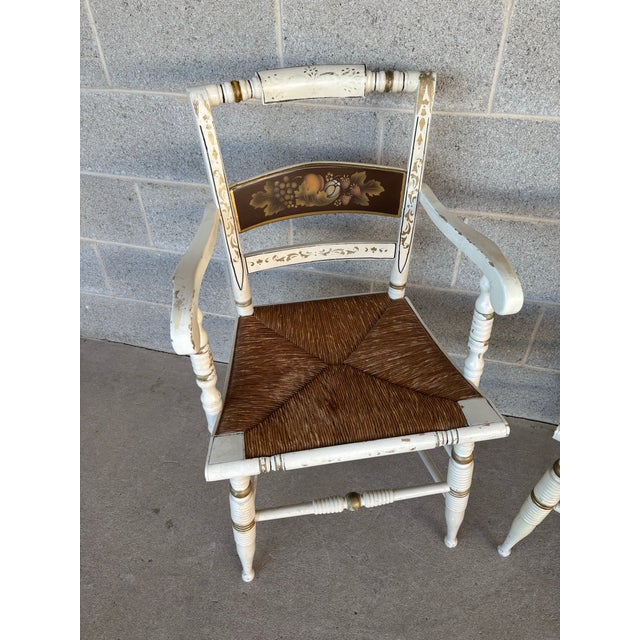 Description: Nichols & Stone Pair of Hitchcock Style Ivory Harvest Rush Bottom Arm Chairs. Original Finish. Paint...
