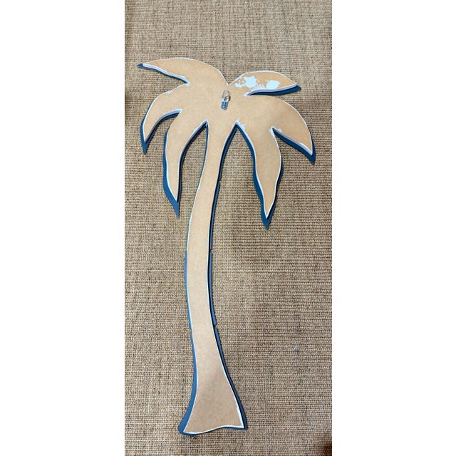 Vintage fun palm tree wall mirror. Easy to hang perfect for coastal whimsy second home.