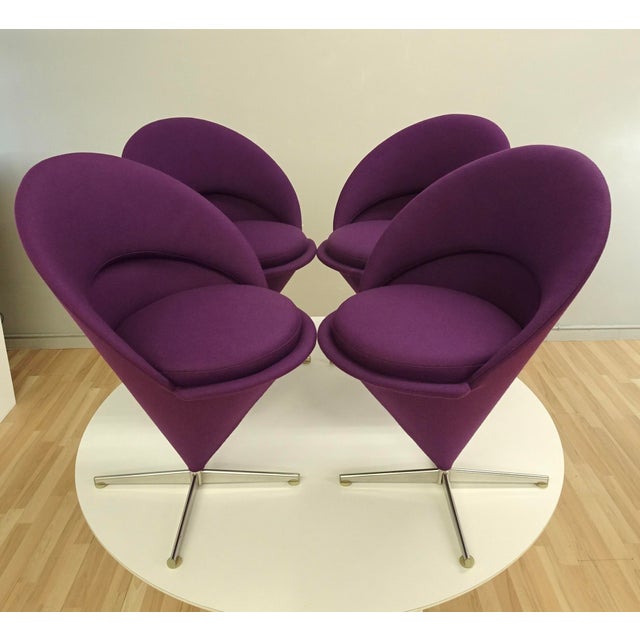 Set of 4 early edition Verner Panton Cone chairs produced by Plus-Linje from 1958 in Denmark. Original label inside and at...
