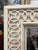 Amazing repeat pattern mirror with wide border and beveled mirror. The whitewash wood frame with lustrous painted finish...
