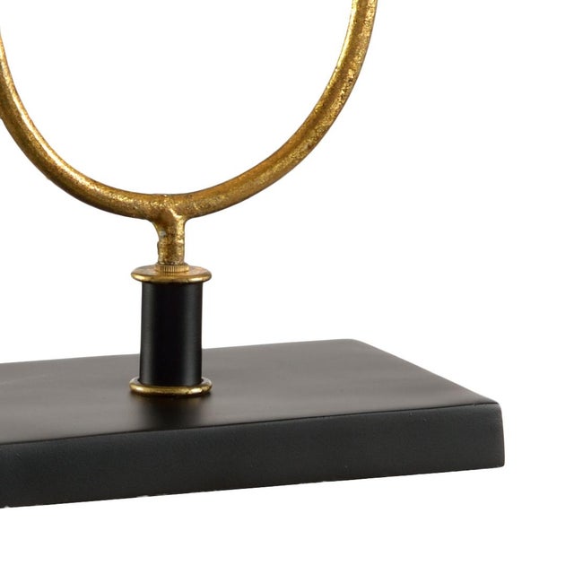 Hand Formed And Gold Leaf Finished Iron Knot, Designed By Lisa Kahn. Clean with a dry cloth