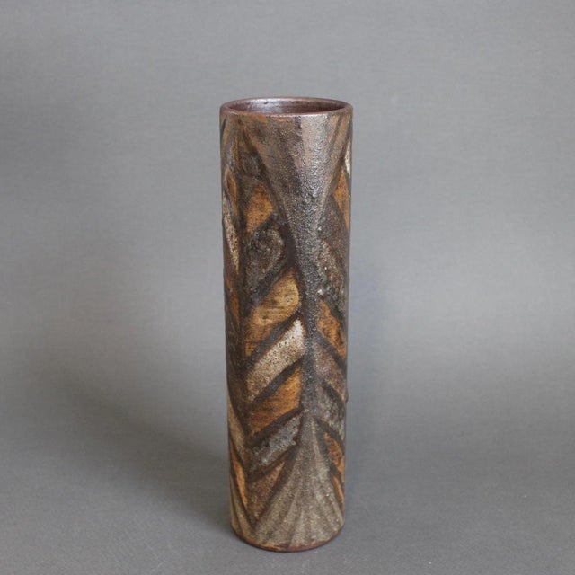French vintage cylindrical ceramic flower vase with plant motif decoration by Alexandre Kostanda, Vallauris, France (circa...