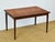 Magnificent walnut dining table dating from the 1960s. features two integrated butterfly extensions and beautiful grain...