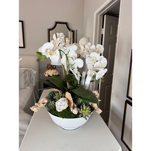 This sculptural centerpiece features an authentic vintage ceramic bowl by Amthor Modern Imports, made in Japan, paired...