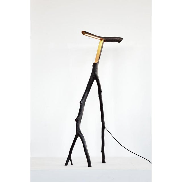 Charred snappy tree friend floor light by marco iannicelli dimensions: w 45-70 x l 45-70 x h 185-210 cm materials: wood....