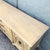 Elegant vintage French Provincial dresser by Detroit Furniture, featuring a softly distressed cream finish accented by...
