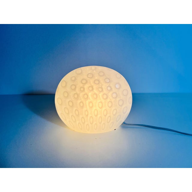 This stunning table lamp, crafted by Peill & Putzler in Germany during the 1970s, is a true example of timeless design....