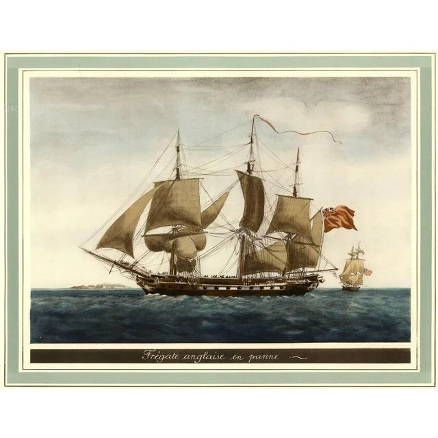 Handcolored heliotype of an English ship after a work of Jean-Jérôme Baugean, created in circa 1920. This original print...