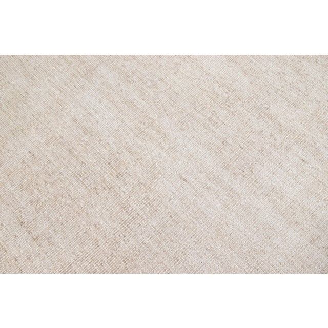 This Modern Groove Collection Rug with measure 4' 0'' x 6' 0'' and Ivory color has a unique handmade design crafted from...