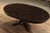 American Round to Oval Dining Table in Dark Walnut Finish, With Self-Storing Leaf. An Ap Exclusive by AntiquePurveyor For Sale - Image 3 of 15