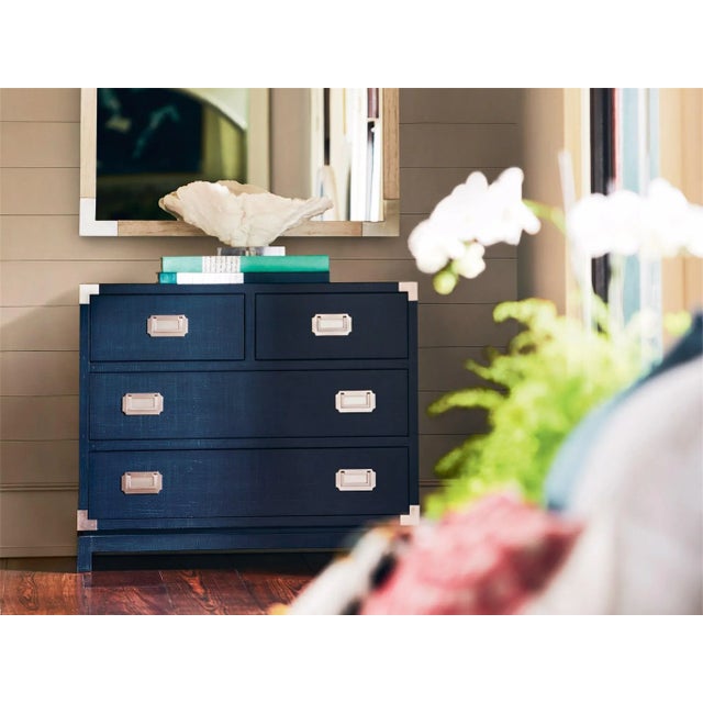 A stunning Marina finish and a vintage trunk-inspired frame define the Coastal Campaign Chest, a bold accent piece built...