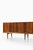 This exceptionally rare sideboard, designed by henry rosengren hansen and produced by brande møbelindustri in denmark...
