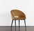 This compact barrel back dining armchair is effortlessly cool. Stocked in gold sky fabric with a black powder-coated steel...