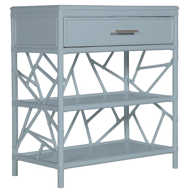 In a whimsical, geometric pattern, this beautiful and functional end table is constructed with a Rattan frame and rawhide...