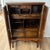 One of a kind-rare find! This gorgeous bar cabinet provides storage for a variety of stemware and glassware, along with...