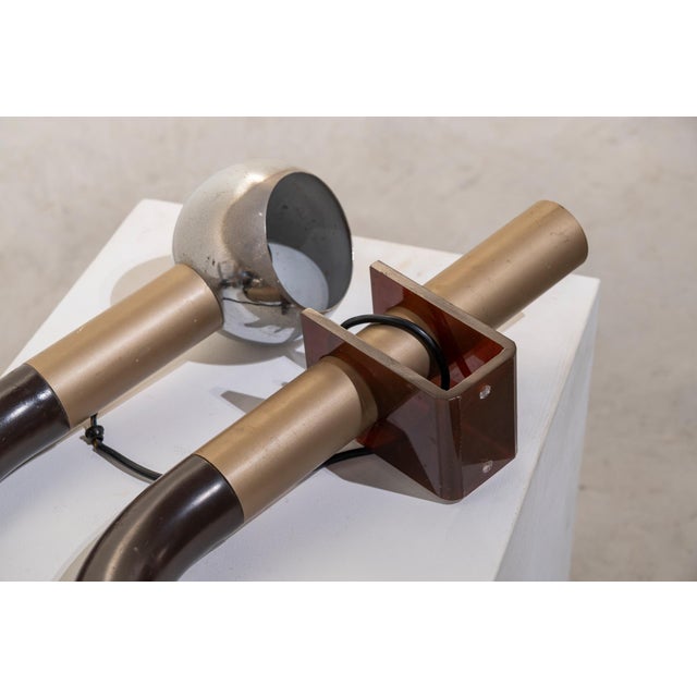 Pair of large wall lights made of aluminum and acrylic glass. Designed in the space age, their shape is reminiscent of...