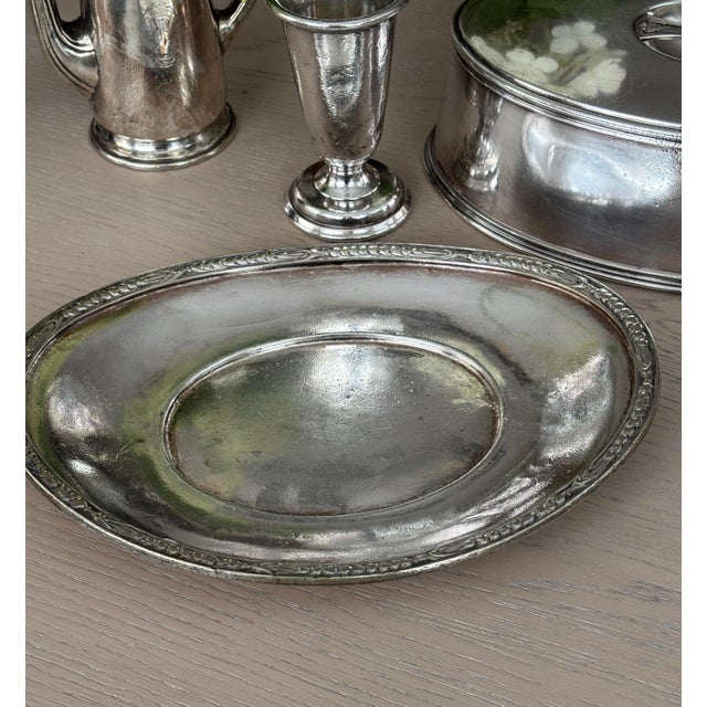An extraordinary, investment-grade piece of New York City high-society history. This heavy-weight silver soldered oval...