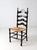 Vintage Hitchcock style ladderback chair with a black painted frame featuring hand stenciled fruit and grape motifs and...