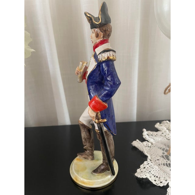 Hand painted porcelain figurine depicting Marshall Ney, a prominent figure in the Napoleanic Wars.