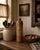 This antique late 1800s stoneware distilled liqueur gin bottle from Rotterdam, The Netherlands, is a remarkable piece of...