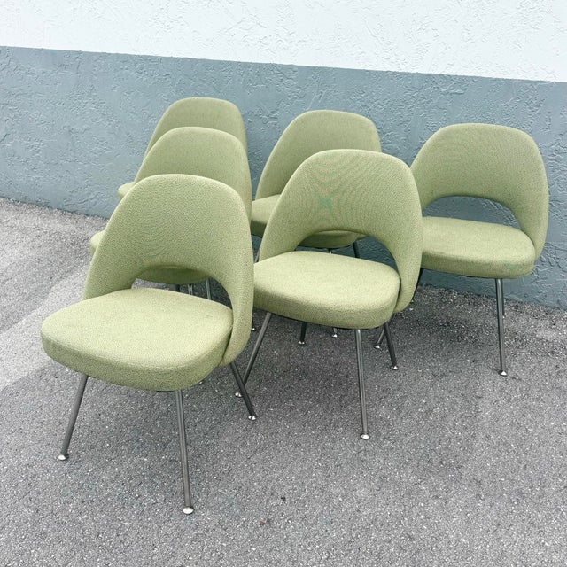 A striking set of six authentic 2001 Eero Saarinen Executive Side Chairs, model 72C, for Knoll, showcasing the designer’s...