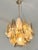 Contemporary and luxury Murano glass chandelier. “Rondini” traditional elements in Murano glass poured over a mold from a...