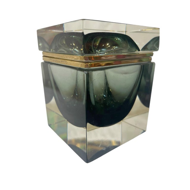 An elegant Italian Murano glass box featuring the Sommerso technique, where layers of colored glass are submerged within...