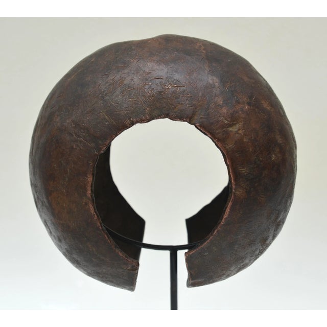 Metal African Mbole Copper Anklet Currency on Stand For Sale - Image 7 of 7