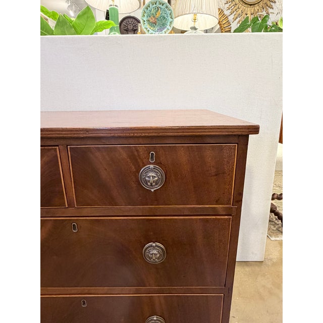 This is a beautiful 19th Century English chest of drawers. Two over three, and very square design, with bracket feet. This...