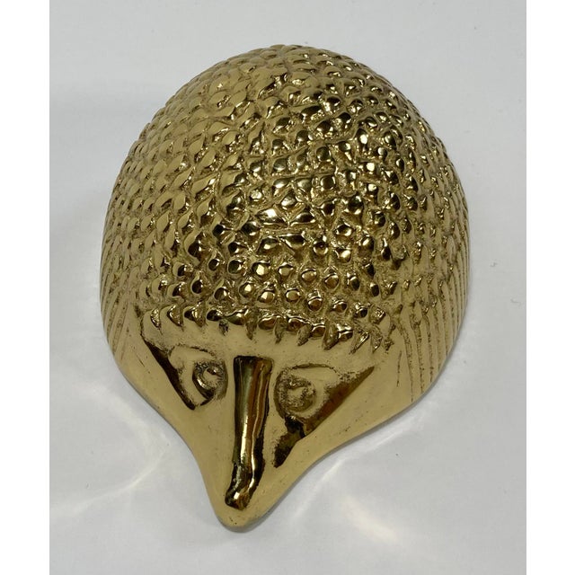 Vintage Virginia Metalcrafters heavy brass paper weight shaped as a prickly round hedgehog. Marked 1994. Lovely patina.