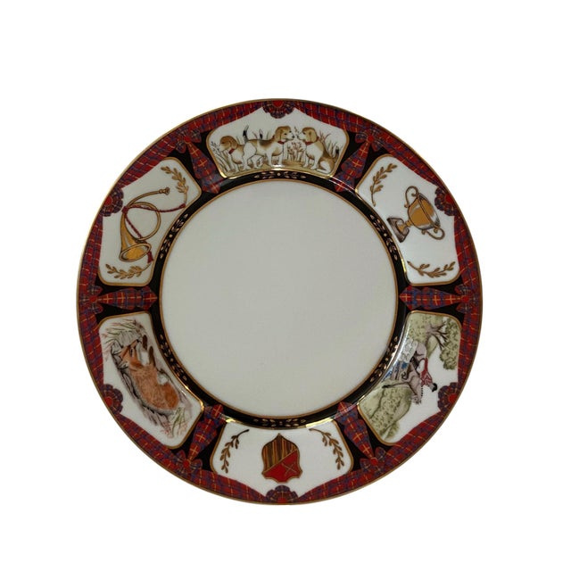 Four dinner plates from The Bombay Company's Royal Equestrian collection, a discontinued line of English manor-style...
