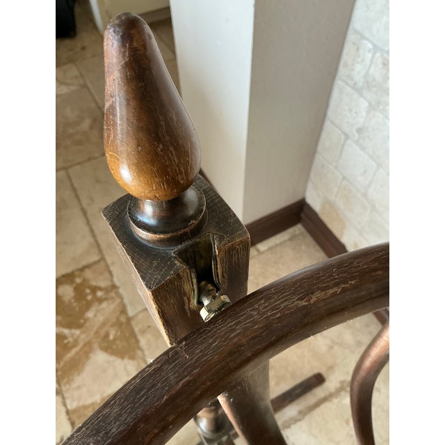 This soulful wooden cradle dates to the late 1800s, crafted in the American folk tradition with turned legs, curved...