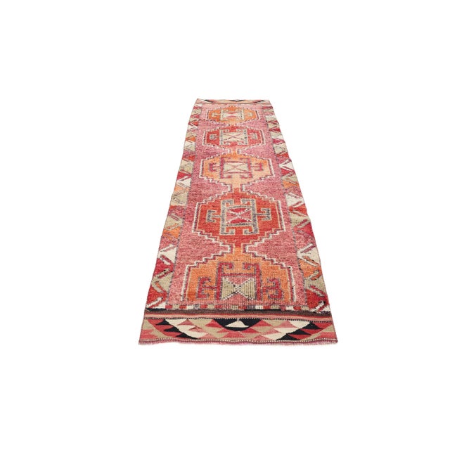 Handknotted vintage decorative Herki runner from Northern Iraq. Approximately 50-60 years old. In very good condition.