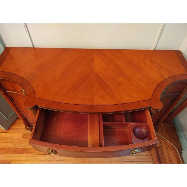 A vintage Robert W. Irwin burl fruitwood English Adams style server cabinet with a hand-painted classical scene, six...