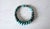 The length of the necklace is 18.5 inches (47 cm). The size of the rondelle beads varies from 16 mm to 33.5 mm. Turquoise...