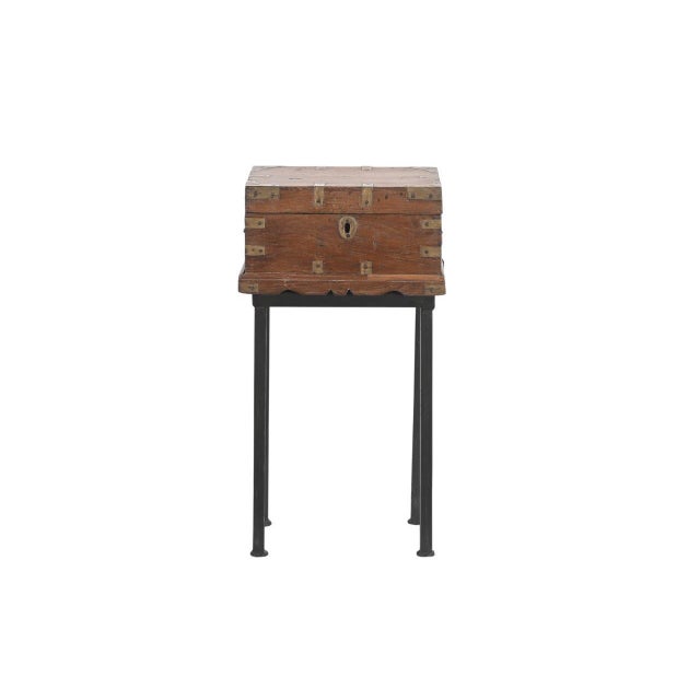 This Vintage Anglo-Indian Teak and Brass Small Chest on Iron Legs/Side Table is handcrafted from solid teakwood and...