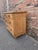 This lovely antique pine chest of drawers dates to the 19th century and has lovely warm grain patina. The wood has a warm...