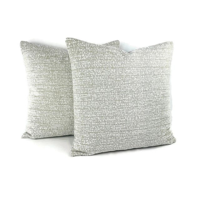 From Perennials is ROCK STEADY in White Sands pillow cover. This pillow features small-scale, textured pattern that...
