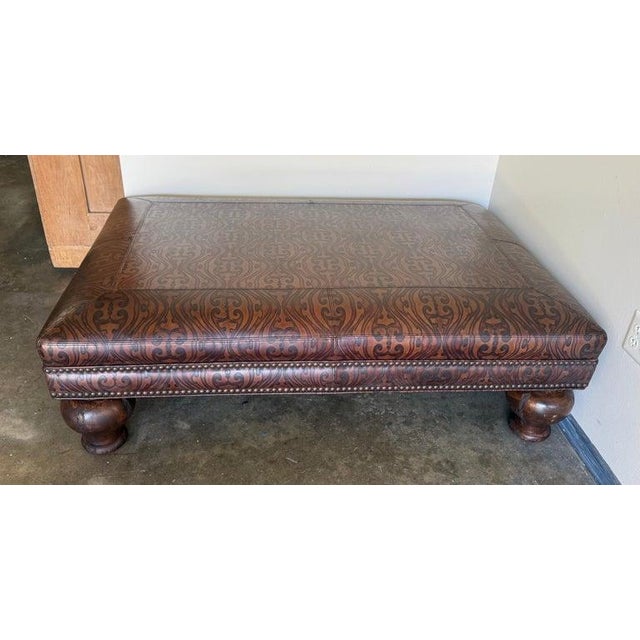 Early 20th Century Spanish Colonial Style Embossed Leather Ottoman With Bun Feet For Sale - Image 5 of 12